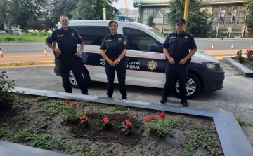 Policewomen planted orange flowers as a sign of solidarity with women and girls victims of violence