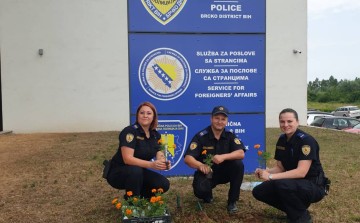 Policewomen planted orange flowers as a sign of solidarity with women and girls victims of violence